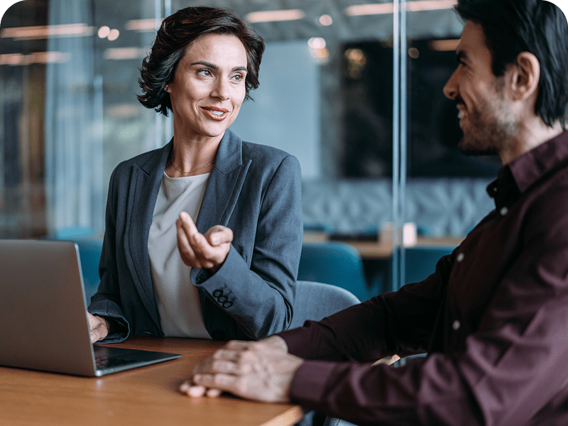 Two people having a business discussion.