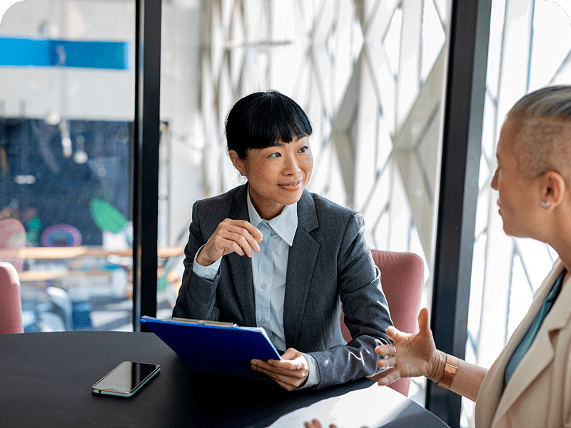Two professionals having a business discussion.