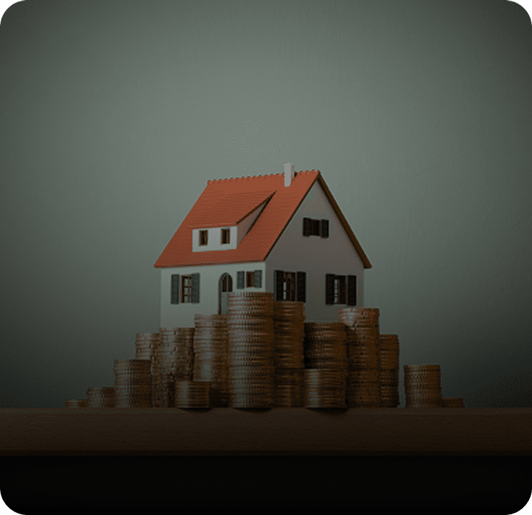 House model surrounded by stacked coins.